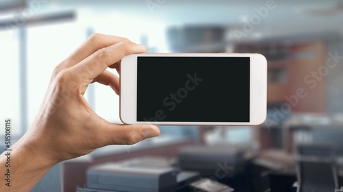 Businessman Holding Smartphone with blank screen, Internet, Social Media with Mobile Phone Device.