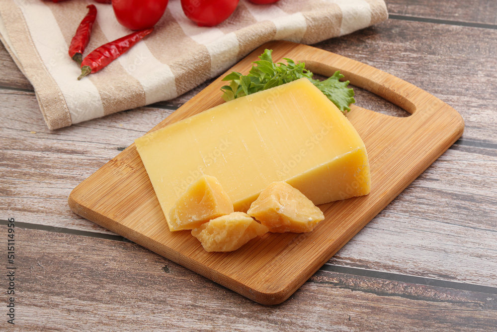 Parmesan hard cheese with small pieces Parmesan hard cheese with small pieces