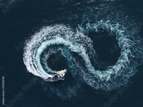 Aerial top view of a white pleasure boat on a summer day Fototapet