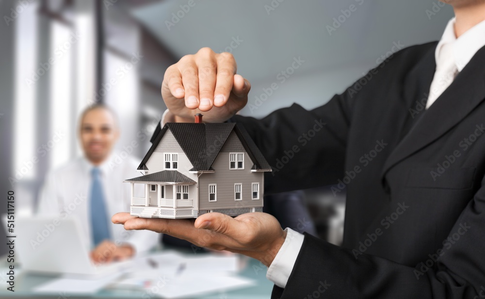 Loan signing concept, refinancing, home and land purchase, rental accommodation, real estate agent or bank employer agreement with a client to Buy a dwelling Loan signing concept, refinancing, home and land purchase, rental accommodation, real estate agent or bank employer agreement with a client to Buy a dwelling