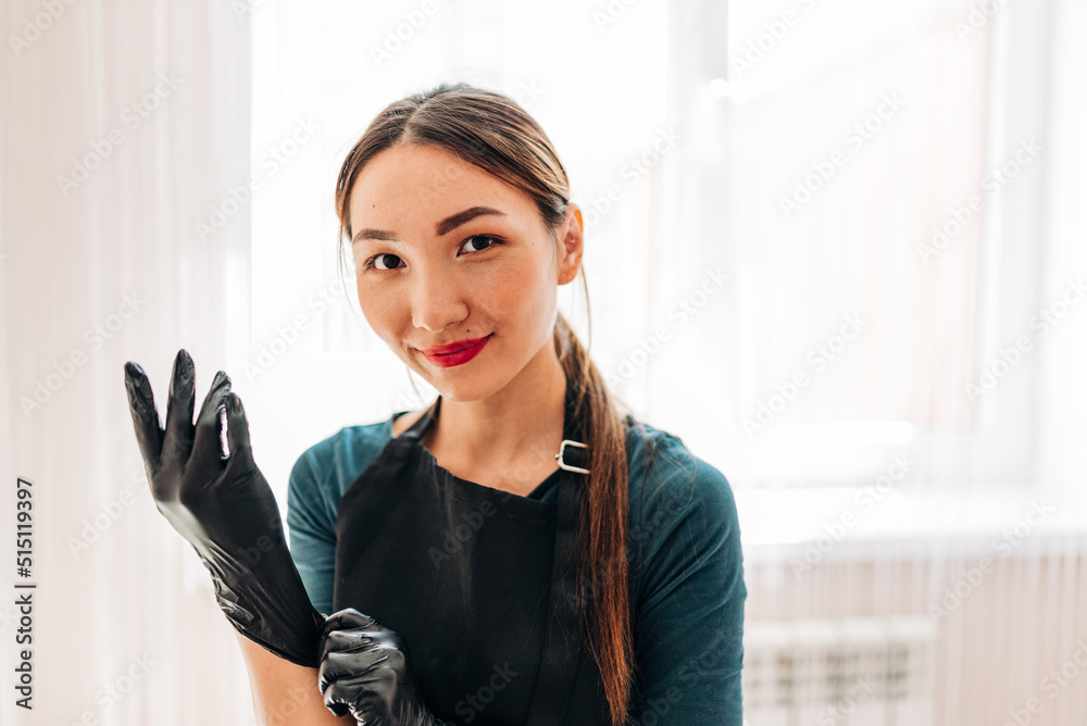 Permanent makup on face, woman having eyelid tattoo in beauty salon Permanent makup on face, woman having eyelid tattoo in beauty salon