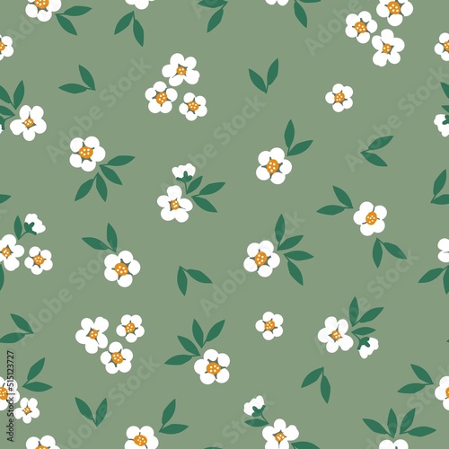 Simple vintage pattern. White flowers, green leaves. Light green background. Fashionable print for textiles and wallpaper.