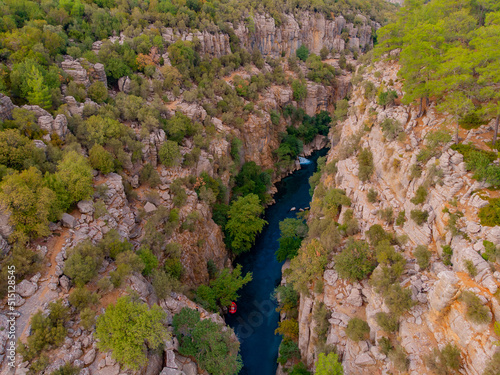 Rafting on rapids on red boat Blue river from Koprulu Tazi canyon Turkey drone aerial top view