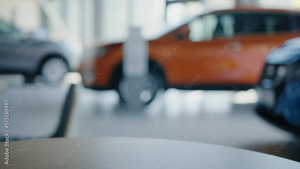 Close-up of car keys in hand. A new car. Dealership