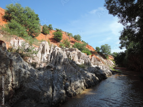 Fairy Stream Canyon,The muddy waters of the Fairy River(Suoi Tien), Tropical oasis scenery of hills with limestone,sandstone plateaux,geological formation.Popular and famous landmark in Mui Ne,Vietnam photo