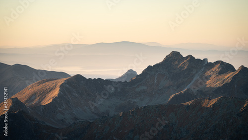 Alpine landscape with mountain ranges, peaks catching last light during sunset, Europe, Slovakia
