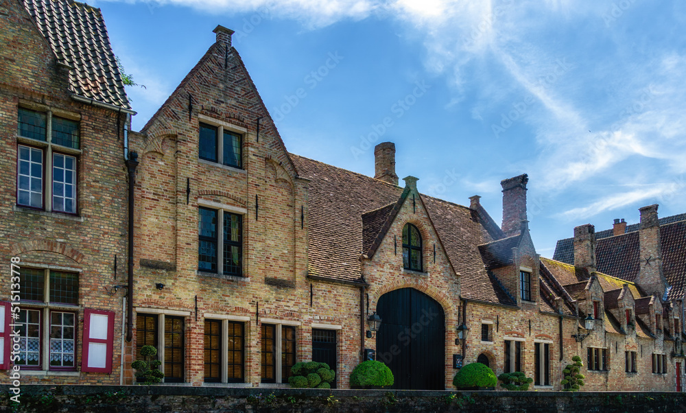 Fototapeta premium The 18th century De Pelikaan almshouses along the Groenerei in Bruges, Belgium