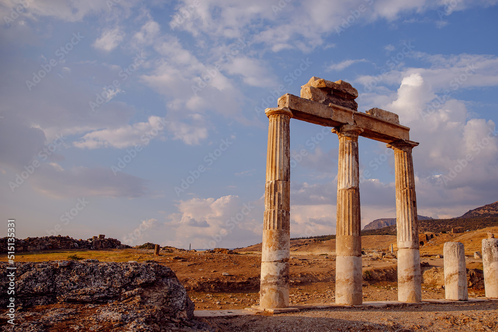Ancient ruins of Amphitheater in Hierapolis city in Pamukkale Turkey sunset