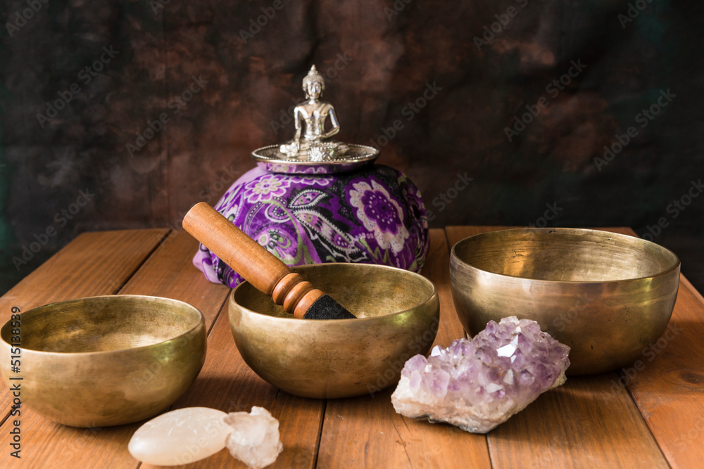 Still life with Tibetan bowls, minerals and a Buddha figure. Still life with Tibetan bowls, minerals and a Buddha figure.