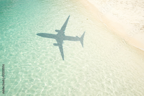 Beautiful tropical beach with airplane shadow