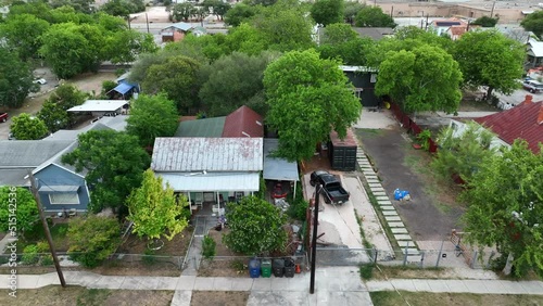 Rural homes in Southwest USA. Residential houses. Aerial truck shot. Hispanic community. photo