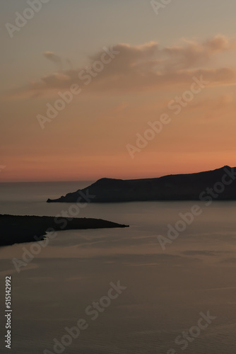 Amazing golden sunset at Santorini in Greece © DIMITRIOS