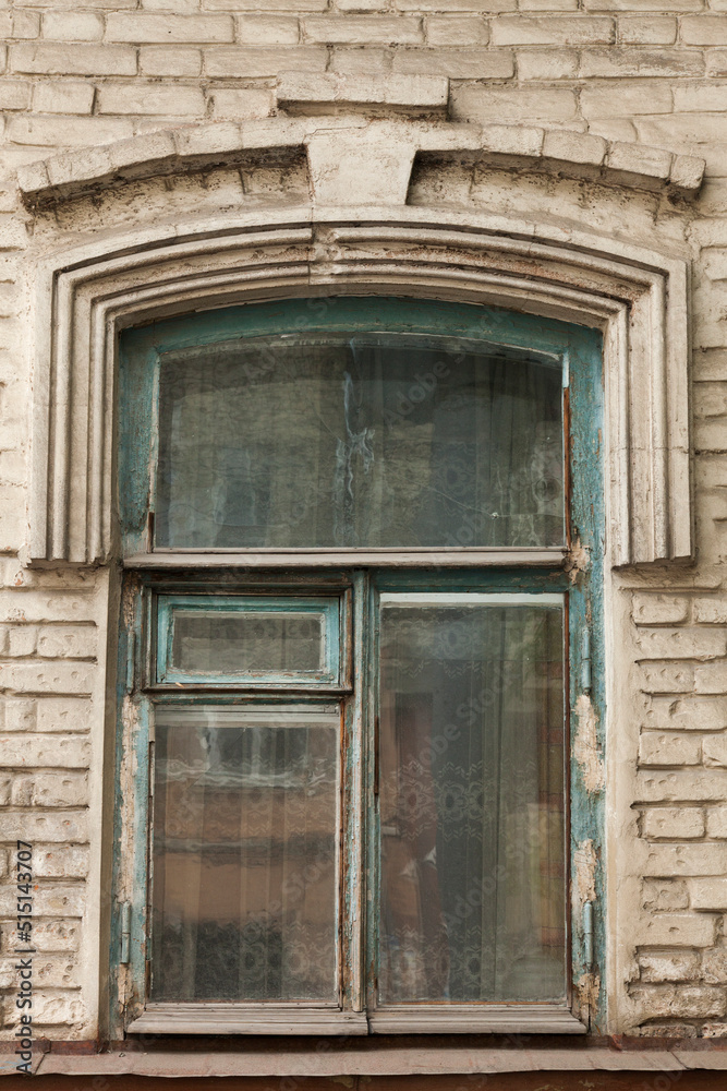 An old wooden window in an old house An old wooden window in an old house