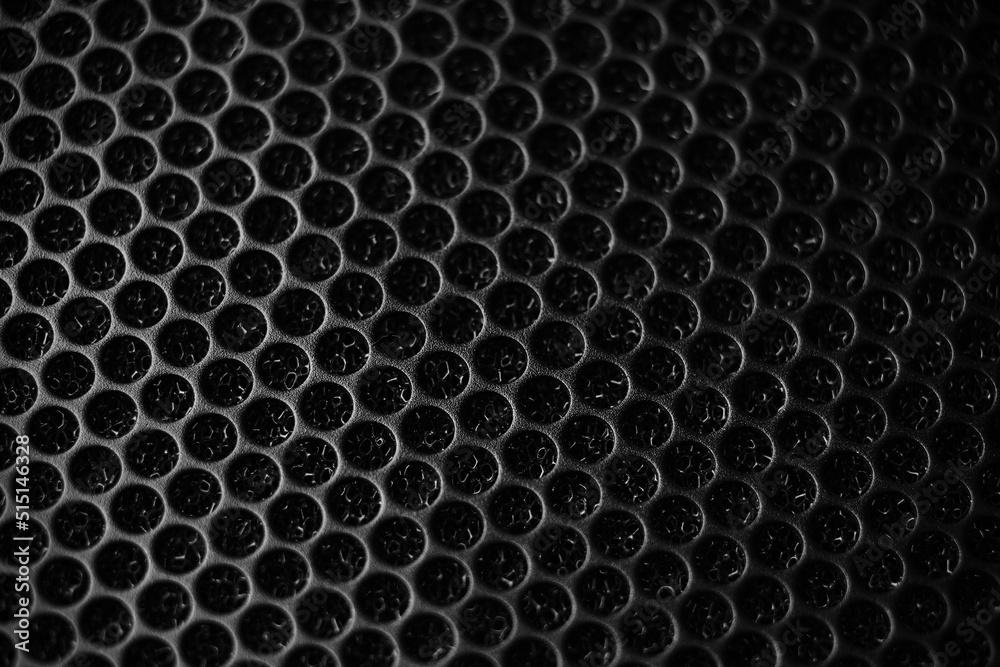 Safety net on the music speaker. Protective grid audio speakers. Close view of Black safety net. Metal perforated mesh, abstract pattern, Abstract black background. Professional audio equipment Safety net on the music speaker. Protective grid audio speakers. Close view of Black safety net. Metal perforated mesh, abstract pattern, Abstract black background. Professional audio equipment