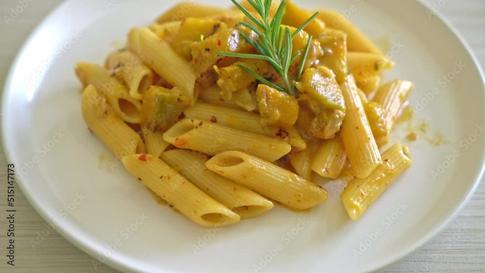 pumpkin penne pasta alfredo sauce - vegan and vegetarian food style pumpkin penne pasta alfredo sauce - vegan and vegetarian food style