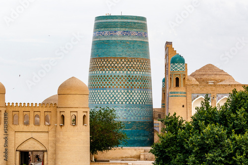 Kalta Minor minaret and city walls in Khiva, Uzbekistan, Central Asia photo