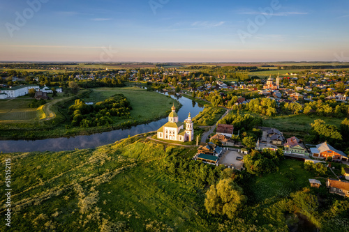 Aerial views of Russian Golden Ring town Suzdal on a sunrise (aerial drone photo). Suzdal, Russia © Oleg Polyakov