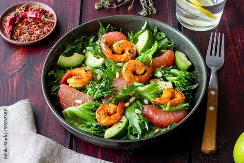 Salad with shrimp, grapefruit, avocado and nuts. Healthy eating. Diet.