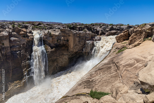 Augrabies Water fall in the Orange river during flood season. The waterfall is in the semi arid area of the Northern Cape Province of South Africa