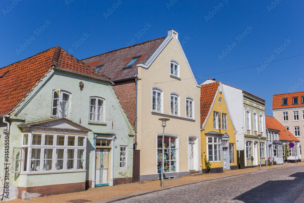 Colorful houses at a cobblestoned street in Tonder, Denmark