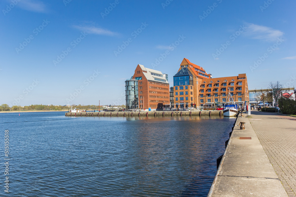 Warehouses at the Unterwarnow river in Rostock, Germany Warehouses at the Unterwarnow river in Rostock, Germany