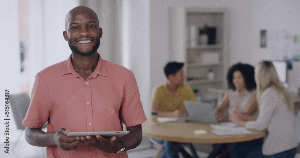 Portrait of young business man browsing online on a digital tablet at work. Creative entrepreneur searching for inspiration on the internet. Male freelance worker doing research at a startup company