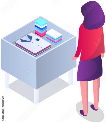 Young woman makes choise in shop. Shopper in boutique looks at goods on stand. Lady stands near showcase with clothes. Shopping, making purchase, buying goods concept. Customer while shopping in store