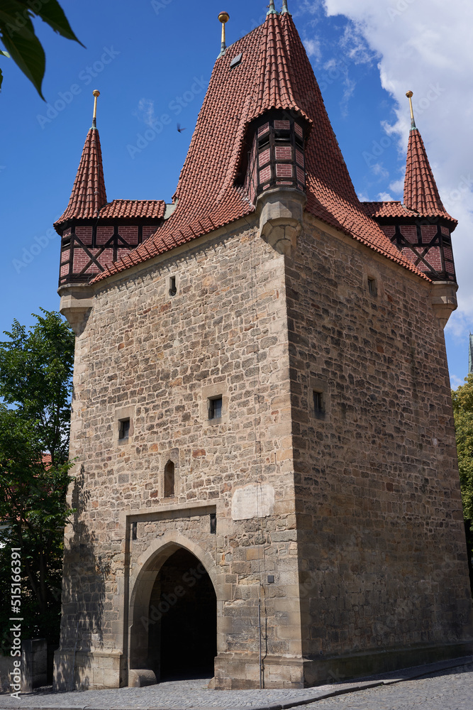 Rakovnik, Czech Republic - July 2, 2022 - the Gothic Prague tower from the 15th century on a sunny summer afternoon
