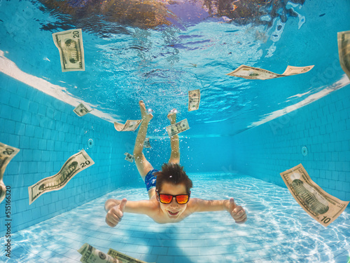Boy Jumping to the Pool of Money. Successful Family holiday or Businessman. Financial Success, Wealth Concept.