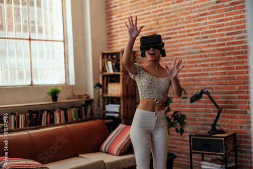 Young woman using augmented reality headset