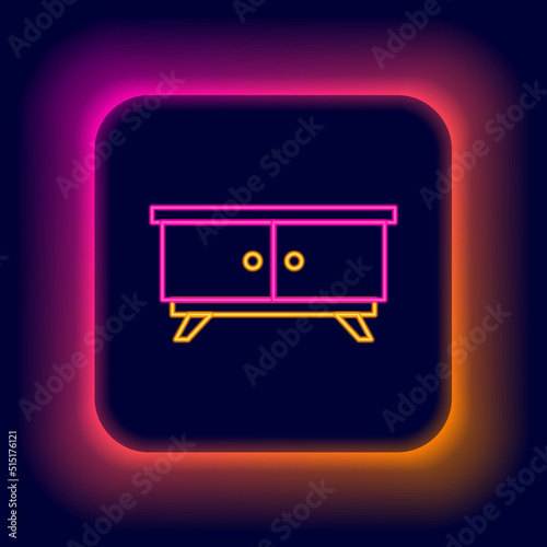 Glowing neon line Furniture nightstand icon isolated on black background. Colorful outline concept. Vector