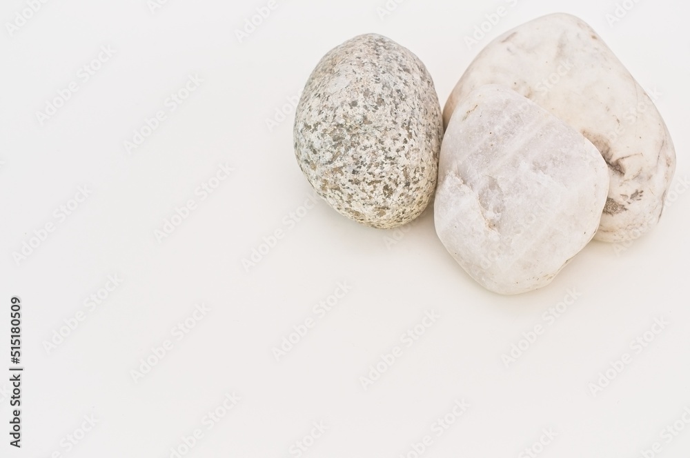 stones on a white desk background with copy space