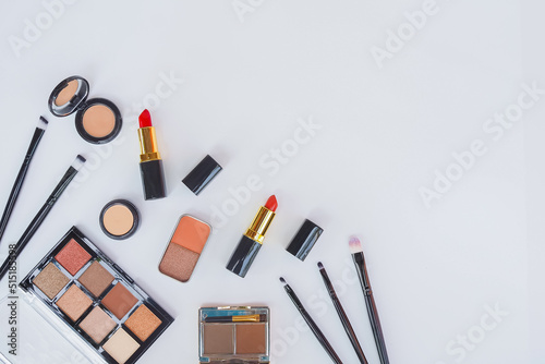 Flat lay composition with makeup cosmotic on white background