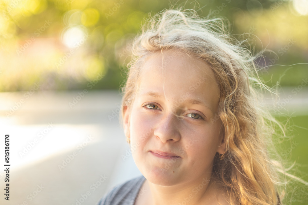 Portrait of a little cheerful girl in a T-shirt. Portrait of a little cheerful girl in a T-shirt.