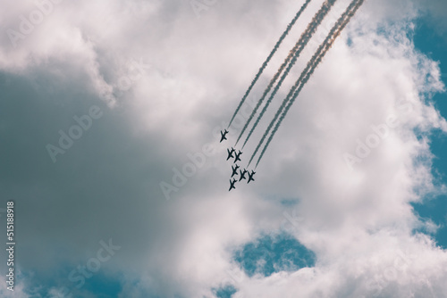 Aaerobatic stunt airshow display leaving smoke trails