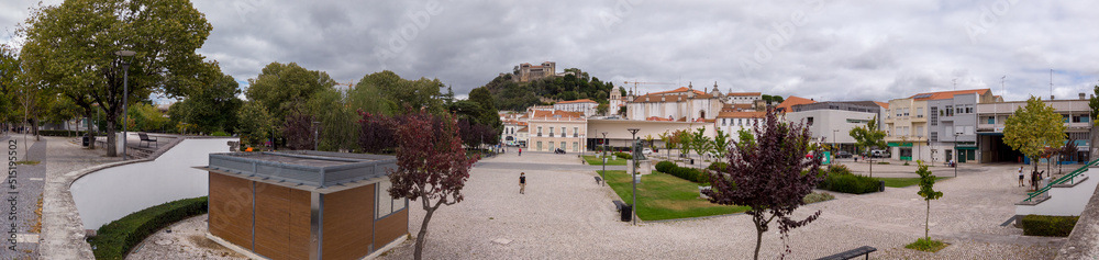 Leiria, Portugal, August 29, 2021: Panoramic view of the Paulo VI Square, the Our Lady of the Immaculate Conception Cathedral and Leiria Castle.