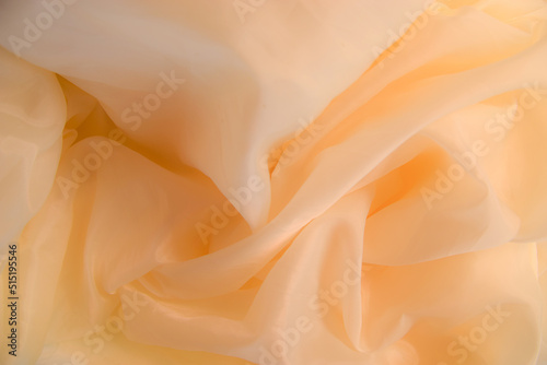 Abstract background luxury cloth wave of gold silk texture satin velvet material