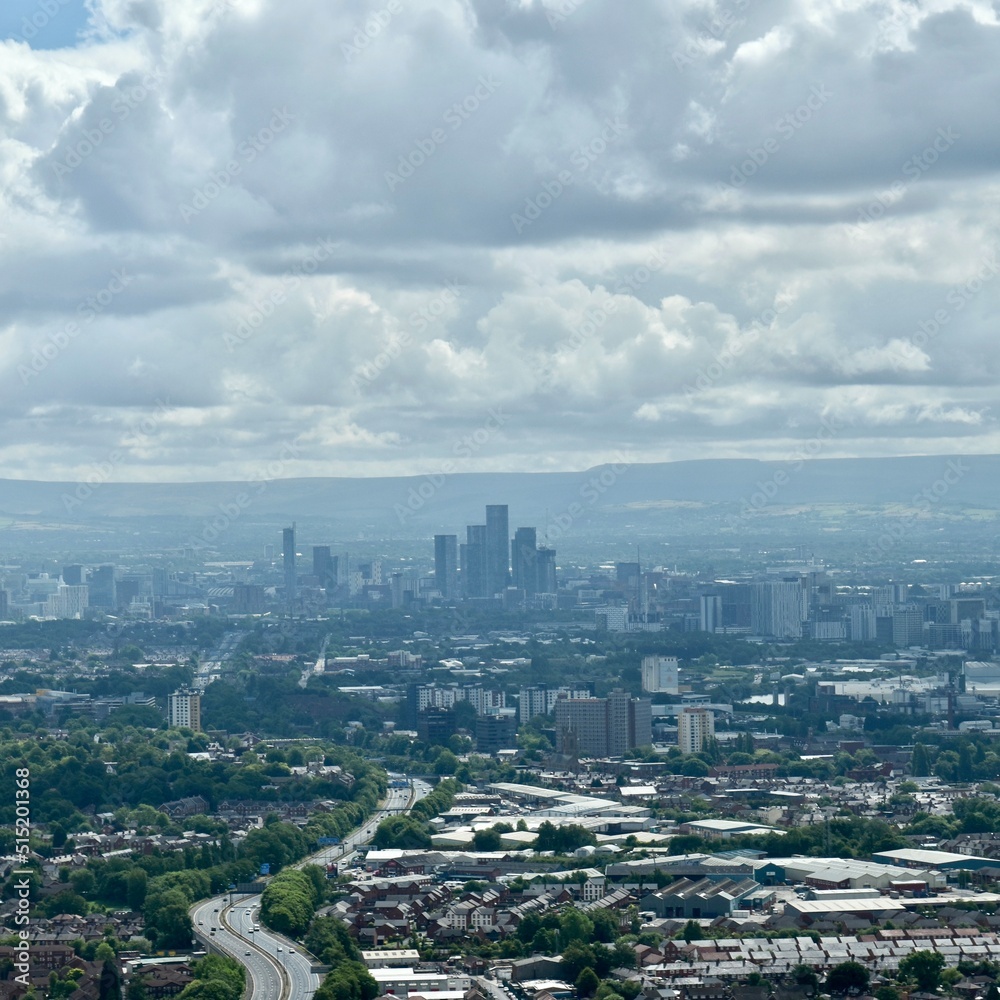 Aerial view of the city and surrounding area. Taken from a helicopter. Manchester England. 