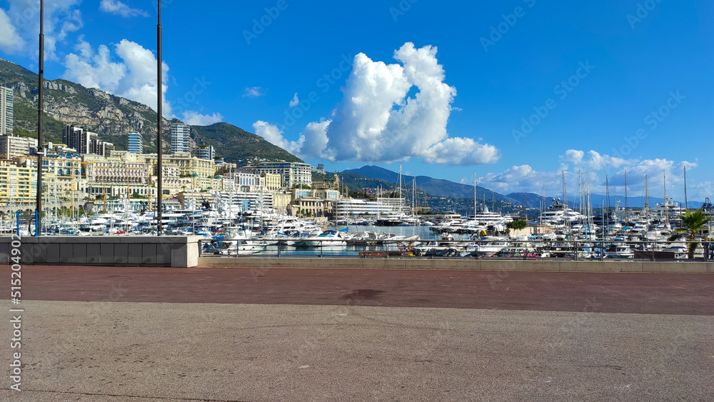 Obraz na płótnie Monaco, October 6, 2021: The Hercules Port is a natural bay at the foot of the ancestral rock of the princes of Monaco. It is one of the few, if not the only deep-water port of the French Riviera. w salonie