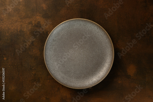 beautiful gray plate on a dark background