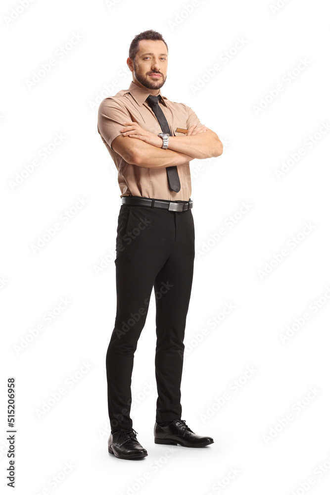 Full length portrait of a young security guard posing with crossed arms Full length portrait of a young security guard posing with crossed arms