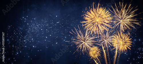 Silvester 2023, New Year's Eve, New Year, Festival Party celebration holiday background - Golden firework fireworks on dark night sky..