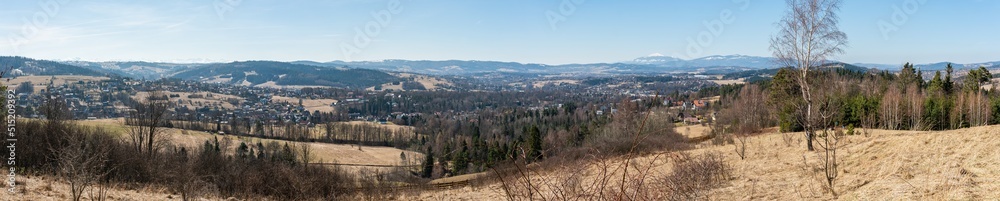 Amazing aerial panoramic view on the mountains, forest, village from observation deck in Poland, Rabka-Zdroj