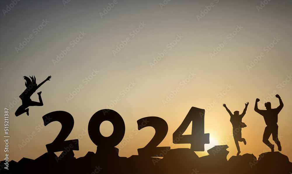 Silhouette with the numbers 2024 on the mountain at sunset against the background of morning sunlight. Silhouette with the numbers 2024 on the mountain at sunset against the background of morning sunlight.