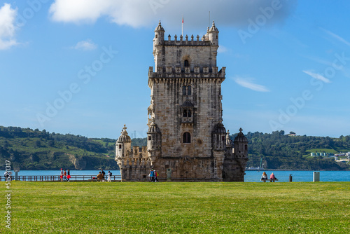 Obraz na płótnie Lisbon, Portugal, April 24, 2022: The Belem Tower (Torre de Belém) was built between 1514 and 1520 in a Manueline style by the Portuguese architect and sculptor Francisco de Arruda. w salonie
