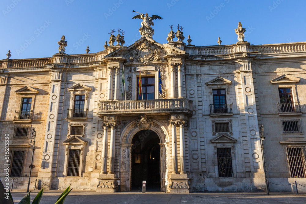 Seville, Spain, September 11, 2021: The facade of the former Royal Tobacco Factory (Real Fábrica de Tabacos de Sevilla) is now the University of Seville (Universidad de Sevilla).