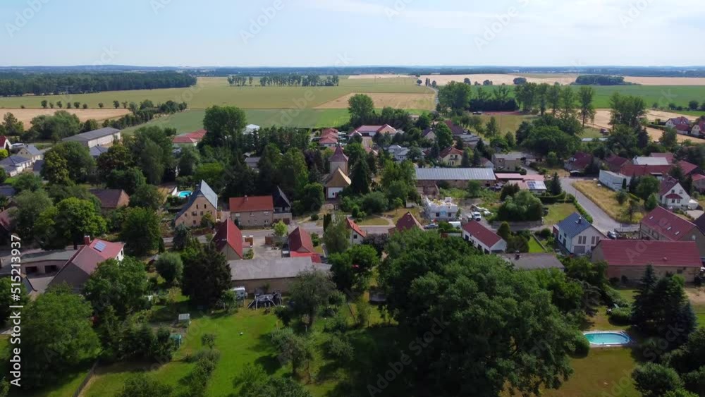 Flight to church in the middle of the village Great aerial view panorama overview drone footage at Countryside Hainichen in Europe Saxony Anhalt, summer 4k Cinematic view from above by Philipp Marnitz Flight to church in the middle of the village Great aerial view panorama overview drone footage at Countryside Hainichen in Europe Saxony Anhalt, summer 4k Cinematic view from above by Philipp Marnitz