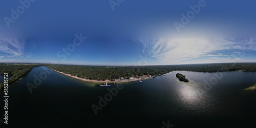 Ready for VR aerial 360 degrees view of IJzeren Man lake with recreational outdoor activity sports and leisure park at the beach shore. Holidays and leisure in The Netherlands.