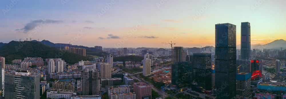 Fototapeta premium an aerial panorama on sunrise cityscape in downtown shenzhen, china