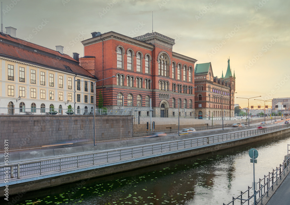 Old National Archive, or Gamla Riksarkivet of Sweden, 1887 - 1890, and the Norstedt Building, overlooking watercourse, located in Riddarholmen island, Stockholm, Sweden